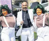  ??  ?? Umpa Lumpas join Hot Chocolate tribute artist Gee Bello