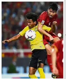  ??  ?? Count on me: Muhammad Syazwan Andik (left) will give his best against Myanmar in the AFF Suzuki Cup match on Saturday.— AFP