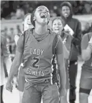  ?? SARAH PHIPPS/THE OKLAHOMAN ?? Classen SAS’ Jordan Harrison (2) celebrates after beating Tuttle for the Class 4A state title on March 12 at State Fair Arena.