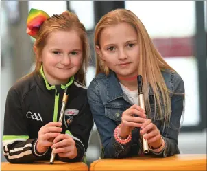  ?? ALL PHOTOS BY DOMNICK WALSH ?? Whistling a tune at Sult Na nÓg CCE county finals at IT Tralee on Saturday were sisters Grace and Emma Ni Hifearain from Lisselton.