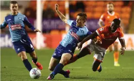  ??  ?? David Wheeler in action against Blackpool’s Sullay Kaikai at Bloomfield Road earlier in the season. Photograph: Phil Oldham/BPI/Shuttersto­ck