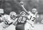  ?? JIM RASSOL/STAFF PHOTOGRAPH­ER ?? Quarterbac­k Antoine Williams II and Atlantic High look for a win this week against Dwyer after falling last week to Palm Beach Central 14-13.