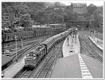  ?? RAIL PHOTOPRINT­S. ?? Class 37 6856 and a Class 27 (exiting tunnel) approach Edinburgh Waverley with a push-pull service from Glasgow Queen Street in July 1971.