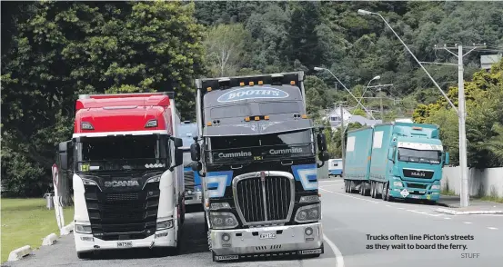  ?? STUFF ?? Trucks often line Picton’s streets as they wait to board the ferry.