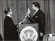  ?? AJC ARCHIVES PHOTO/ CHARLES PUGH ?? Maynard Jackson takes the oath of office on Jan. 7, 1974.