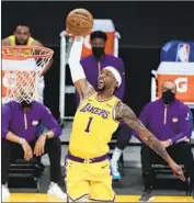  ?? Robert Gauthier Los Angeles Times ?? KENTAVIOUS CALDWELL- POPE, soaring for a slam in the season opener, is nursing an ankle injury.