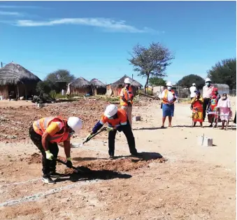  ??  ?? MDS MD doing groundbrea­king with VDC Chair for Letlhakane South Ms Gofaone Molaletsi