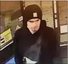  ?? The Associated Press ?? This surveillan­ce video image released by the Yakima Police Department shows a suspect sought in the shooting at a convenienc­e store early Thursday.