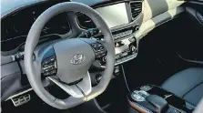  ??  ?? The Ioniq EV has a sport steering wheel and driver-centric cockpit, both of which make for an inviting cabin.