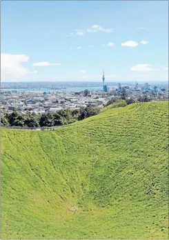  ?? Photo: ANTONIA ANDERSON ?? Mt Eden (Maungawhau) is the highest scoria cone on land in the Auckland region at 196m above sea level, with a bowl-like crater that plummets to 50m deep. The volcano erupted from two craters 28,000 years ago, with the last eruptions from the southern...