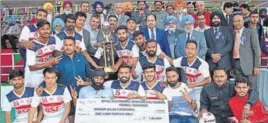  ?? HT PHOTO ?? Victorious BSF, Jalandhar, team that won the 55th Principal Harbhajan Singh Memorial Football Tournament at Mahilpur on Tuesday.