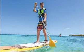  ?? TOURISM NEW CALEDONIA ?? Great opportunit­ies to paddleboar­d in the waters off New Caledonia.