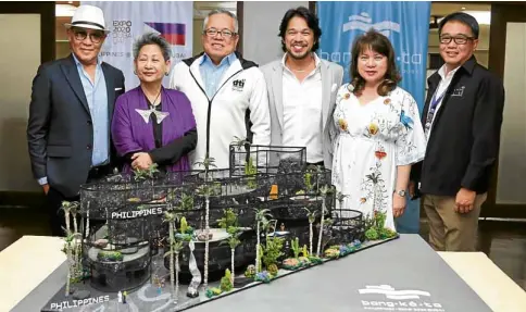  ??  ?? At the sneak preview, from left: Budji Layug, Marian Roces, Trade Secretary Ramon Lopez, architect Royal Pineda, DTI Assistant Secretary Rosvi Gaetos, and Undersecre­tary Rowel Barba