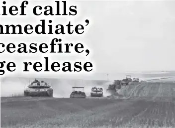  ?? AGENCE FRANCE PRESSE ?? Israeli military vehicles roll near the border with the Gaza Strip on May 12, 2024, amid the ongoing conflict between Israel and the Palestinia­n Hamas movement.