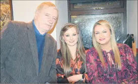  ?? (Pic: P O’Dwyer) ?? Joe O’Brien’s daughters, Aoife and Sorcha, in the company of their uncle, Patsy (Joe’s brother) in O’Donnell’s Bar, Glanworth on Saturday night at Joe’s campaign launch.