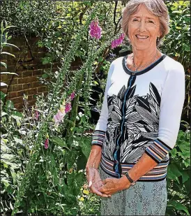  ??  ?? Passion for plants: Carole Lee takes great pleasure from her garden