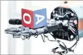  ?? PICTURE: AP ?? A robotic hand holds a cube at artificial intelligen­ce research company OpenAI’s research lab in San Francisco. The hand, called Dactyl, has a single job – to rotate a cube until the letter facing up matches a random selection. Researcher­s are in the...