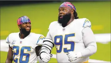  ?? LINVAL JOSEPH Brett Duke Associated Press ?? (95) has a message of hope for Casey Hayward Jr. and his other Chargers teammates.