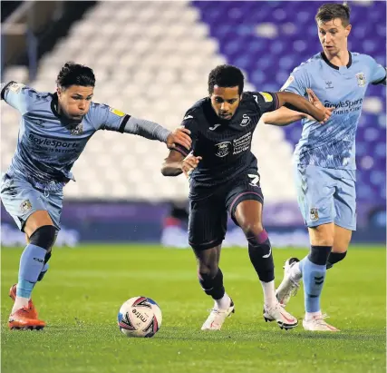  ?? Picture: Ross Kinnaird/Getty ?? Former Bristol City captain Korey Smith, centre, in action for Swansea during Tuesday’s 1-1 draw against Coventry at Birmingham City’s St Andrew’s ground