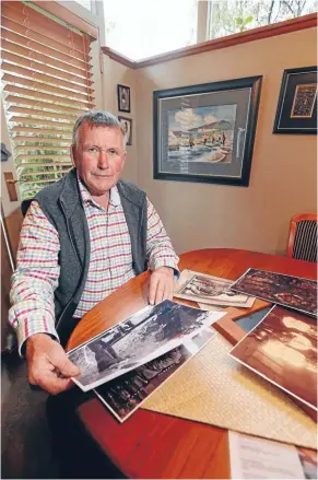  ?? Photo: CAMERON BURNELL ?? Making history: Allan Dodson with a few of his photos of Porirua soldiers.