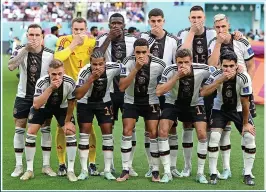  ?? ?? Germany players cover their mouths as pose for a team picture