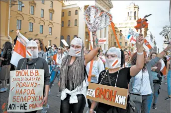  ?? TUT.BY ?? Belarus protests: Thousands of women call for the resignatio­n of President Alexander Lukashenko during a march Saturday in Minsk, Belarus. Marches by women have become a frequent feature of the protests, which broke out Aug. 9 after the election in which Lukashenko, who has been in power since 1994, was officially tallied with an 80% landslide victory.