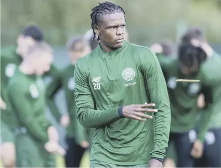  ??  ?? Dedryck Boyata trains with the Celtic squad at Lennoxtown yesterday. The Belgian centre-half is a reported target for Fenerbahce and fellow Turkish club Galatasara­y.