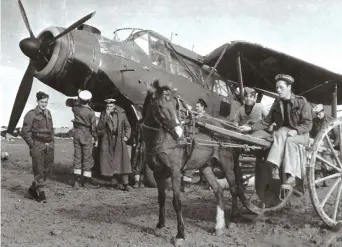  ??  ?? Above: A Fairey Albacore is serviced at Luqa, Malta, in March 1943. (Photo courtesy of Jack Cook)