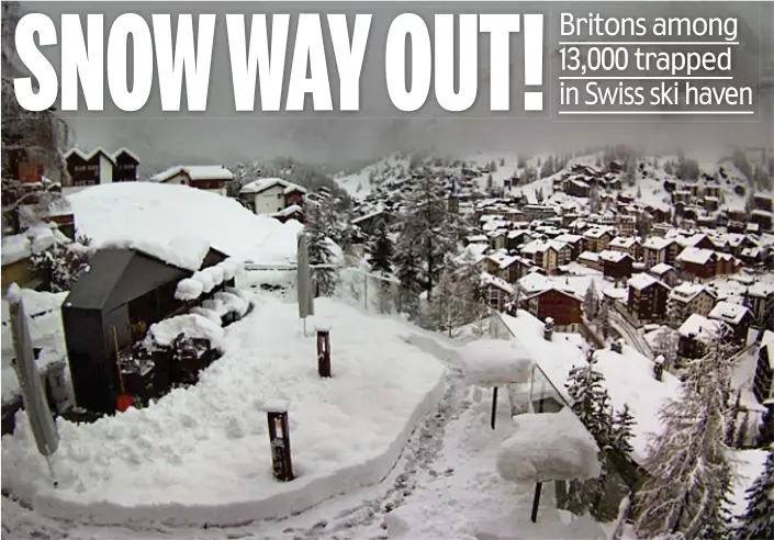  ??  ?? Whiteout: The scene yesterday in Zermatt, which has been cut off after five feet of snow fell in two days. Authoritie­s have closed ski slopes for fear of an avalanche