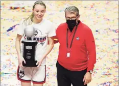  ?? David Butler II / USA TODAY ?? UConn’s Paige Bueckers, the Big East tournament’s Most Outstandin­g Player, and coach Geno Auriemma are expected to get a No. 1 seed in the upcoming NCAA tournament.