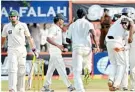  ??  ?? Azhar Ali walks off after being caught by Thilan Samaraweer­a