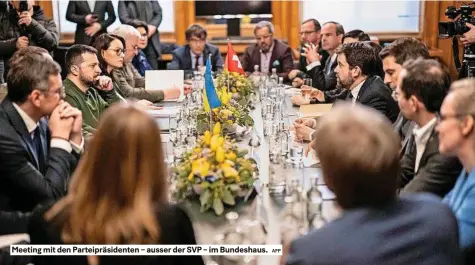 ?? AFP ?? Meeting mit den Parteipräs­identen – ausser der SVP – im Bundeshaus.
