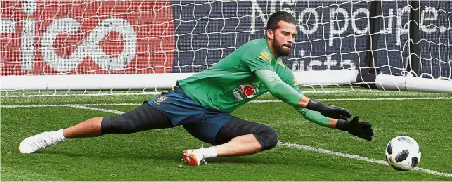  ??  ?? Liverpool signed Brazil internatio­nal Alisson from AS Roma on Thursday, smashing the world record for a goalkeeper in a deal worth up to £72.5mil (RM343mil). — Reuters