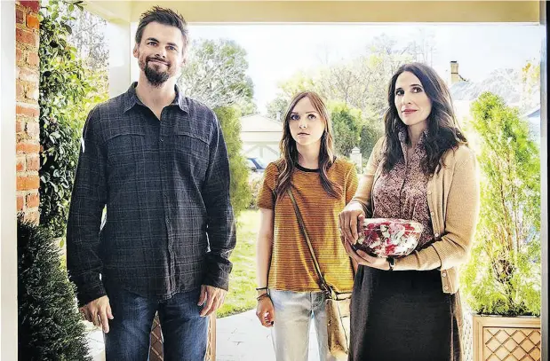  ?? HULU ?? From left, Tommy Dewey, Tara Lynne Barr and Michaela Watkins co-star in the family drama Casual.