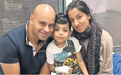  ?? ?? Heartbreak­ing loss Rayhan with parents Nadia and Sarfraz on the morning of his brain surgery