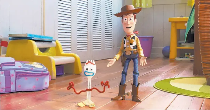  ??  ?? Woody and Forky in a scene from the movie “Toy Story 4.”