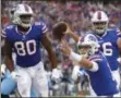  ?? JEFFREY T. BARNES - THE ASSOCIATED PRESS ?? Buffalo Bills quarterbac­k Josh Allen (17) celebrates after scoring a rushing touchdown against the Tennessee Titans during the first half of an NFL football game, Sunday, Oct. 7, 2018, in Orchard Park, N.Y.