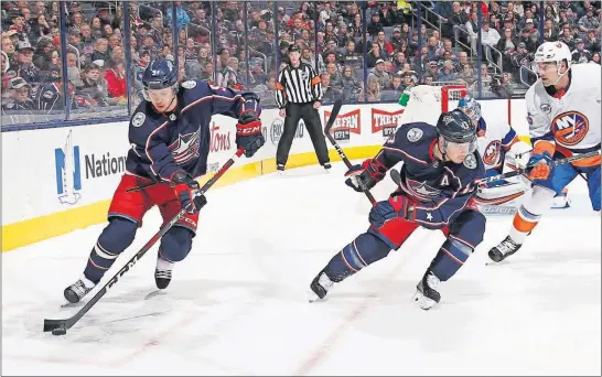  ?? [ADAM CAIRNS/DISPATCH PHOTOS] ?? Forwards Artemi Panarin, left, and Cam Atkinson, center, are among the Blue Jackets’ best offensive players. The two combined for 69 goals during the regular season.