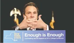  ?? AP PHOTO/ MARY ALTAFFER ?? Gov. Andrew Cuomo speaks during an April ceremony at New York University on the day he signed a bill into law that requires New York state’s private colleges and universiti­es to have a new, affirmativ­e sexual consent policy to combat campus sexual violence.