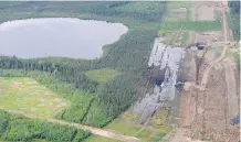  ?? GARRETT BARRY/ POSTMEDIA NEWS ?? Barriers are being put in place to keep animals from entering the area of last week’s bitumen, water and sand spill within Nexen’s Long Lake facility near Fort McMurray.