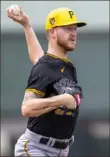  ?? Benjamin B. Braun/Post-Gazette ?? Pirates pitcher Bailey Falter throws the ball at Pirate City during spring training on Feb. 17 in Bradenton, Fla. Unlike in the 2022 campaign, when Falter pitched to a 3.86 ERA and made a postseason start for Philadelph­ia, Falter labored to a combined 5.36 mark in 2023.