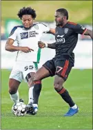  ?? BILLINGS/ THE OKLAHOMAN] ?? Oklahoma City's Mekeil Williams, left, tries to take the ball away from Orange County's Darwin Jones during a USL game in April. The Energy will try to notch three standings points on Saturday against Colorado Springs at Taft Stadium. [NATE