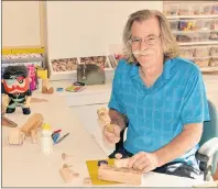  ?? 5&33&/$& .$&"$)&3/ 5)& (6"3%*"/ ?? Dan Viau works on one of the hand-crafted wooden toys available for sale at The Toy Factory store he owns with his wife Kathy in New Glasgow.