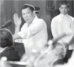  ??  ?? File photo shows Duterte gesturing while answering a question during a forum with local and foreign businessme­n at Malacanang Palace in Manila. — AFP photo