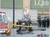  ?? MATHEW MCCARTHY WATERLOO REGION RECORD ?? Regional police investigat­e at the scene of a fatal motor vehicle collision in a parking lot near Homer Watson Boulevard and Ottawa Street in Kitchener on Friday.