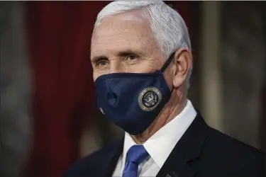  ?? J. SCOTT APPLEWHITE — THE ASSOCIATED PRESS ?? Vice President Mike Pence finishes a swearing-in ceremony for senators in the Old Senate Chamber at the Capitol in Washington on Sunday.