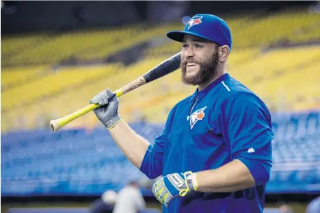  ?? PAUL CHIASSON/THE CANADIAN PRESS ?? The big catch for the Toronto Blue Jays in free agency was catcher and Montreal native Russell Martin, who signed on for five years at $82 million. Martin is returning to his hometown as the Jays complete their exhibition schedule with a pair of games...