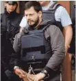  ?? FOTO: DPA ?? Marc Dutroux im Jahr 2000 vor dem Justizpala­st.