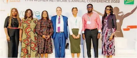  ?? ?? HR Business Partner, FMN, Olushola Odeyinde ( left); CEO, Sterling One Foundation, Olapeju Ibekwe; Chairperso­n, FMN Women Network, Olasubomi Sofowora; Chairman, FMN Board of Directors, John G. Coumantaro­s; Founder / CEO Reelfruits, Affiong Williams; Head Sales B2C, FMN, Ademola Adeoye; and the Executive Director, Coronation Merchant Bank, Mrs. Funke Ladimeji at the FMN Women Network’s yearly conference 2022 held at Eko Hotel, Lagos.