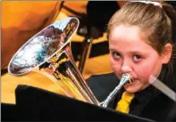  ??  ?? Charlie Boax,13, plays baritone for Irvine & Dreghorn Brass band